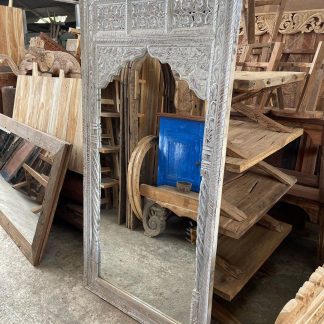 carved-wooden-mirror