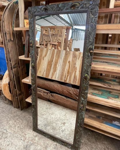 carved-wooden-mirror
